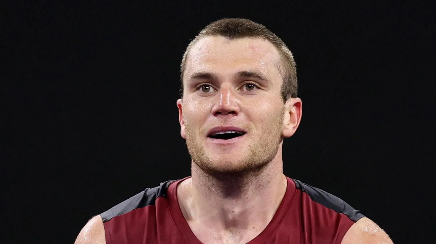 Jack Draper smiles during a match