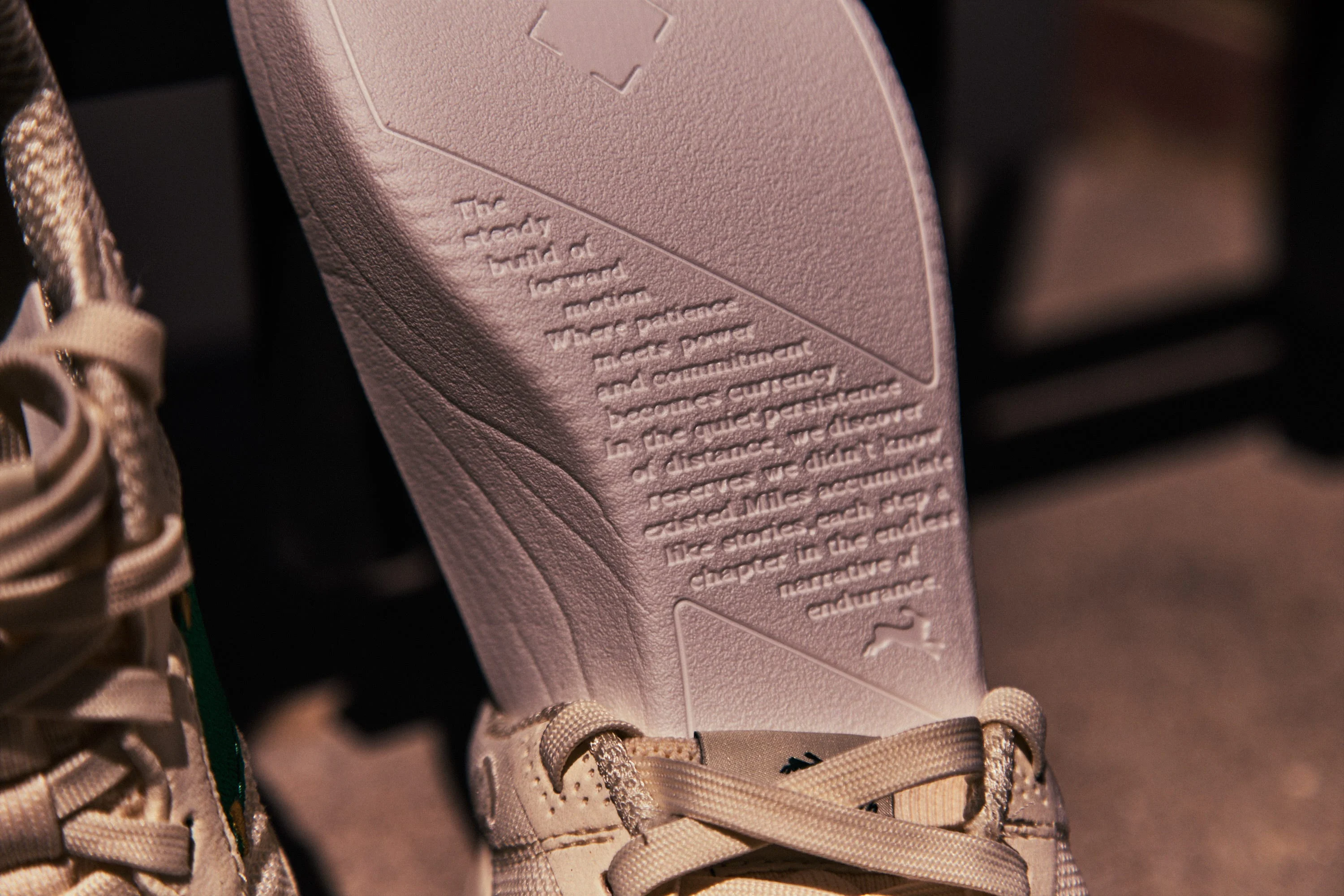 Shoe insole with motivational text about endurance and persistence. Shoe insole with motivational text about endurance and persistence.