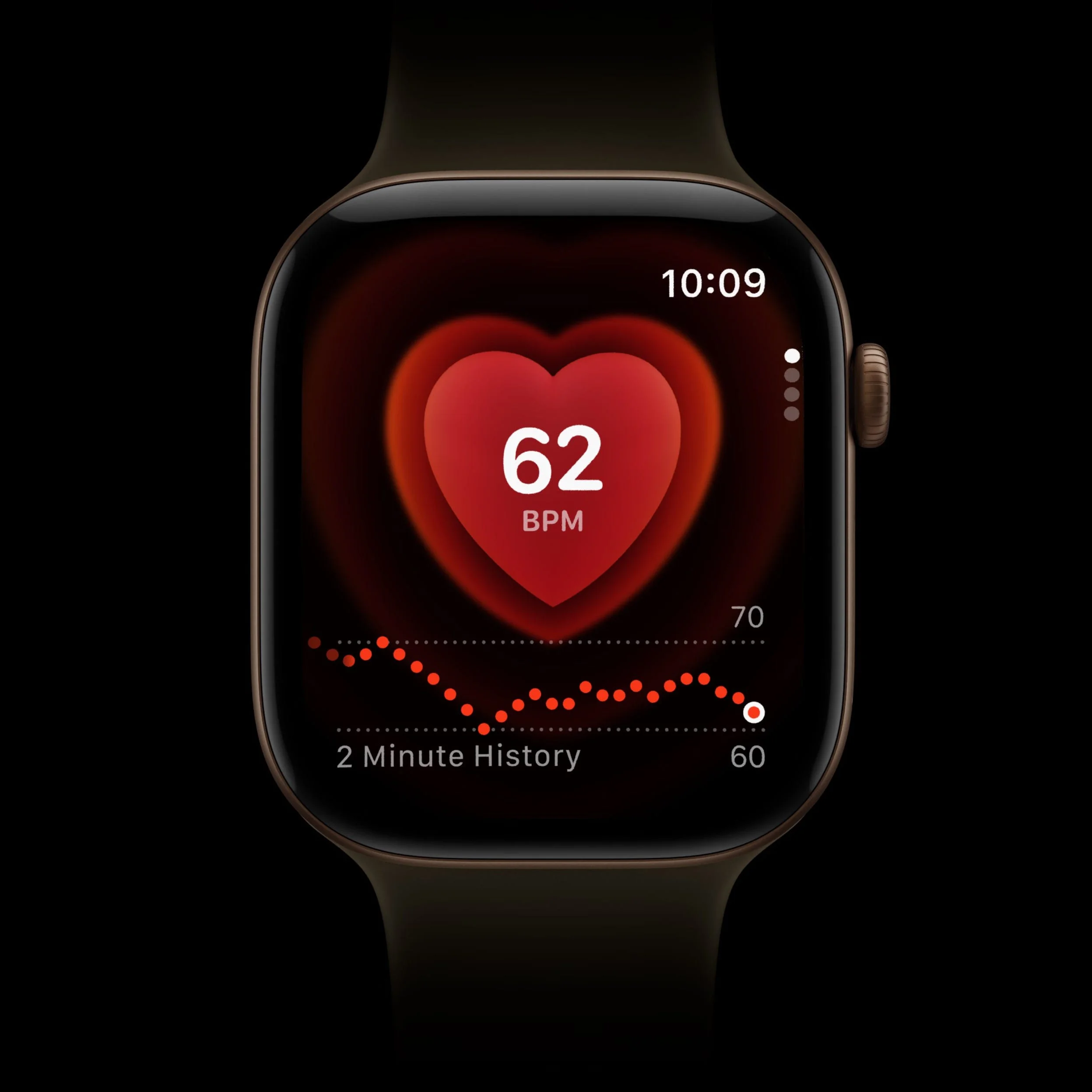 Heart rate monitor on an apple watch displaying a heartbeat of 62 BPM with historical graph on smartwatch screen. Heart rate monitor on an apple watch displaying a heartbeat of 62 BPM with historical graph on smartwatch screen.